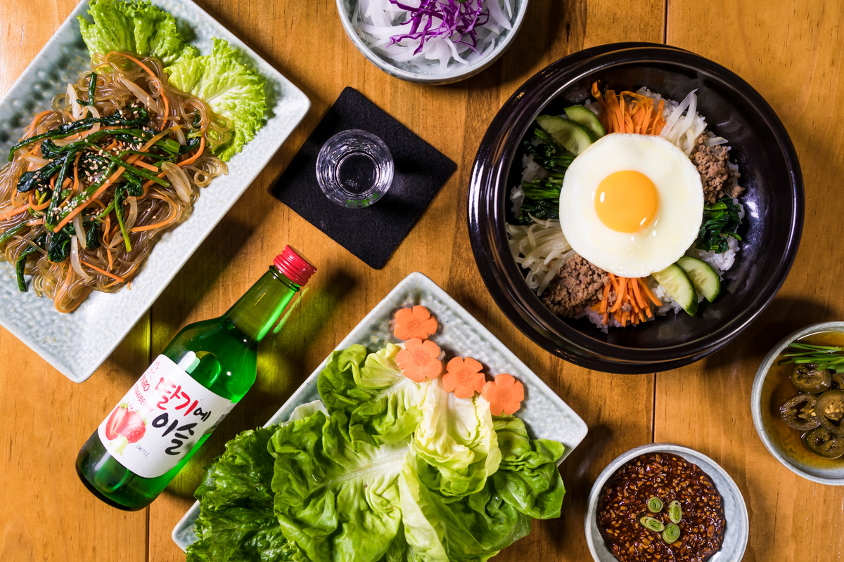 Top View of Soju and an Assortment of Korean Food